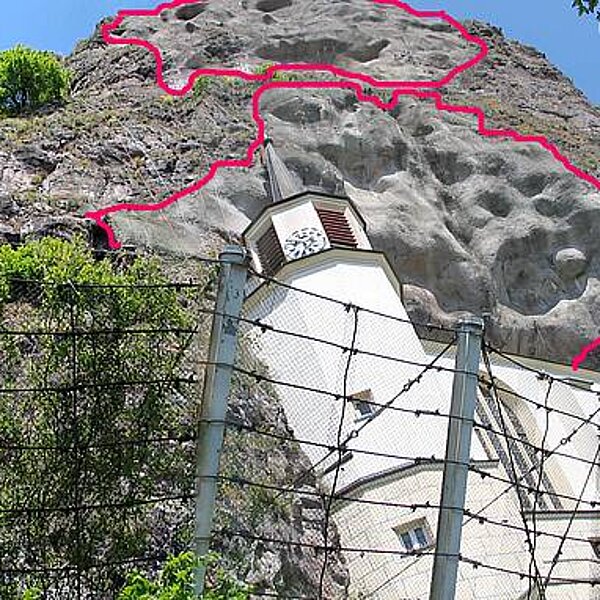 Fangzaun an der Felsenkirche und aufgetragener Spritzbeton (rot umrandet). Steinschlag- und Felssturzgefährdung der Felsenkirche in Idar-Oberstein